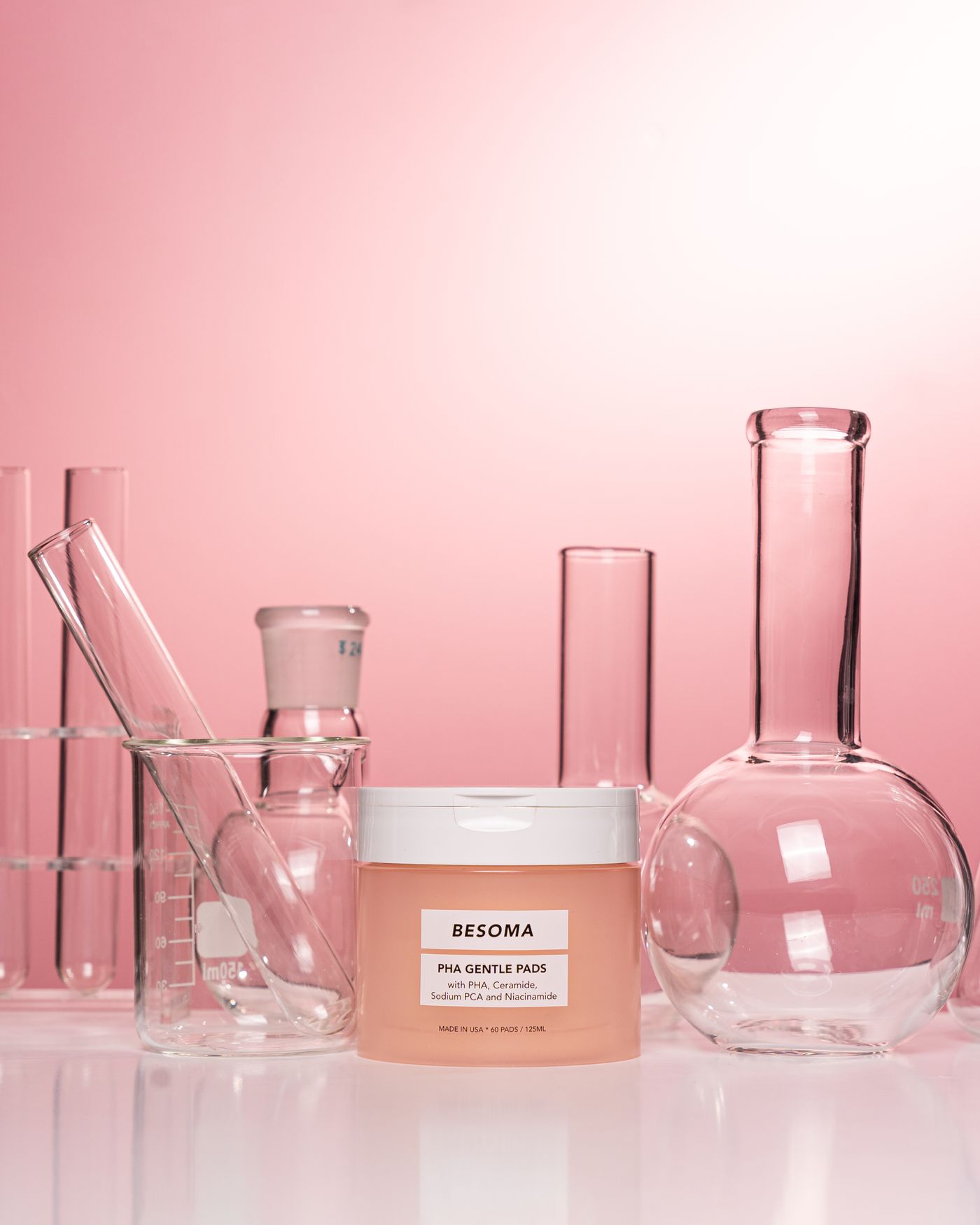 Ceramides — cream beside lab glassware